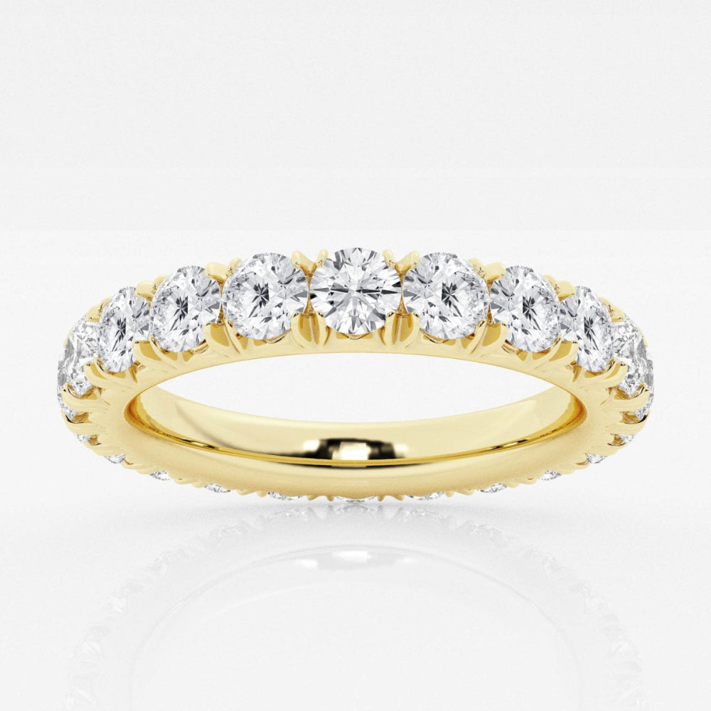 Lab grown diamond eternity band set in yellow gold. 