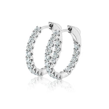 Side view of lab grown diamond hoops in white gold. 