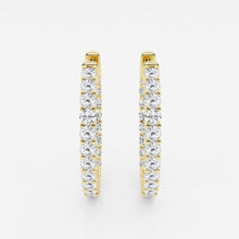 Front view of lab grown diamond hoop earrings set in yellow gold. 