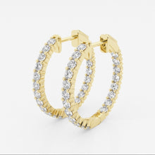 Side view of lab grown diamond hoops in yellow gold. 