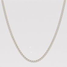 Lab grown diamond tennis necklace with four prongs in yellow gold. 