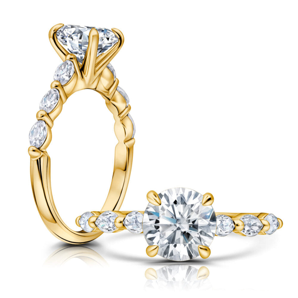 Front and Side View of a Round Diamond Engagement Ring with Three Side Stones set in Yellow Gold