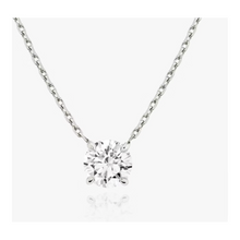 Lab grown round diamond pendant on a white gold chain.